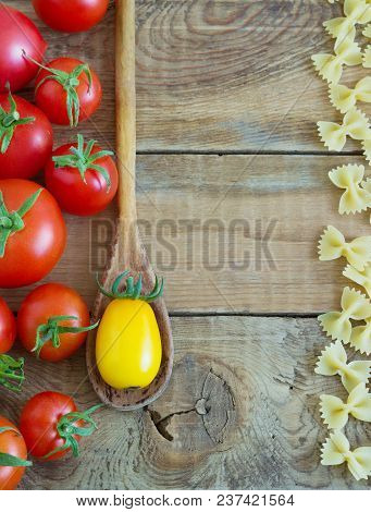 Beautiful Tasty Colorful Pattern Of Italian Pasta, Tomatoes. Top View. Abstract. Food Concept.
