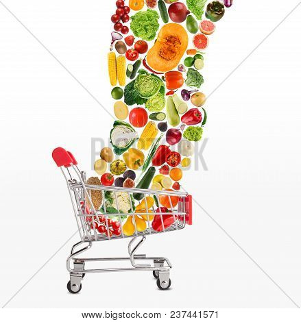 Grocery Cart With Vegetables And Fruits Falling In It Isolated On White. Healthy Meals Shopping, Cor