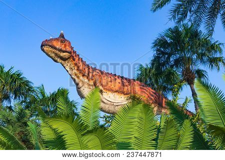 Pattaya,thailand- April 14,2018: Carnotaurus Model In A Tropical Garden Park Of Suan Nongnooch, Patt