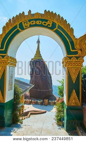 The Golden Stupa On The Top Of The Black Rock Is One Of Numerous Places Of Worship, Located On The S