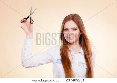 Haircare Concept. Cutting And Trimming. Young Prefessional Female Barber Hairstylist With Scissors. 