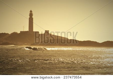 The Lighthouse And Golding Surf.
Trafalgar Lighthouse In Caños De Meca,cadiz,spain.