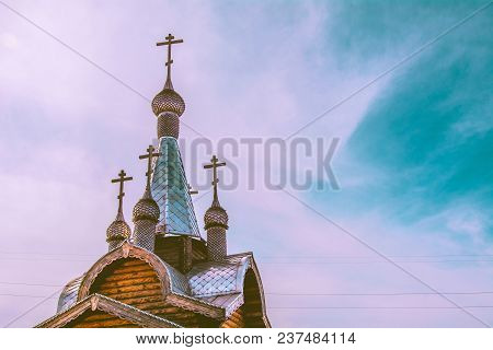 Silver Domes Of The Church Against The Sky With Clouds.