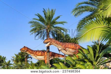 Pattaya,thailand- April 14,2018: Carnotaurus Statue In A Tropical Garden Park Of Suan Nongnooch, Pat