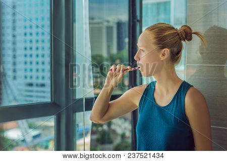 Young Woman Brushing His Teeth In My Bedroom.