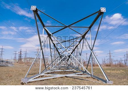 A New Metal Power Transmission Support Lies On The Ground.