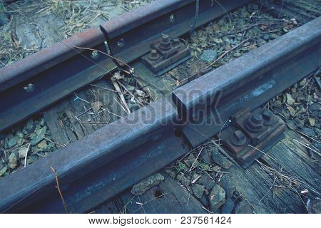 Old Rusty Rails In Station Aproved For Demolition. Railway Details, Rails Joint With Gap, Nut And Sc