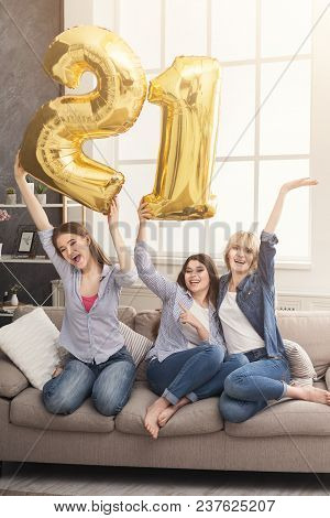 Happy Emotions Of Three Girls Celebrating Birthday Party Of 21 Years With Golden Baloons At Home. Ho