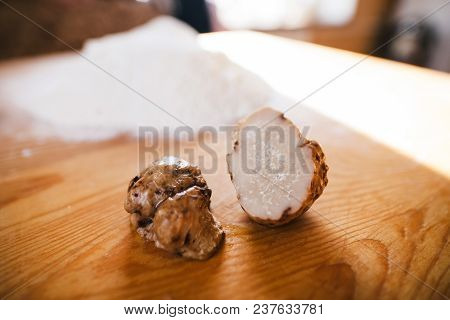 White Truffle On A Wooden Cutting Board