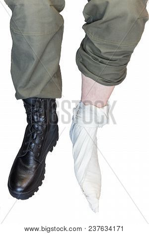 Two Legs Wearing Footcloths With Military High Burts Boots Isolated On White Background