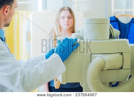 Girl During Xray Scanning In The Hospital. Healthcare Theme.