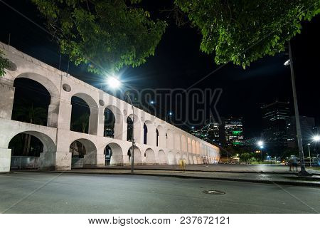 Famous Lapa Arches, Also Known As Carioca Aqueduct, At Night In Rio De Janeiro, Brazil