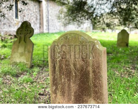 Churchyard stone grave headstones