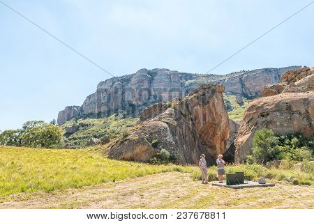 Kerkenberg, South Africa - March 14, 2018: Two Unidentified Tourists At Retiefklip, An Historic Site