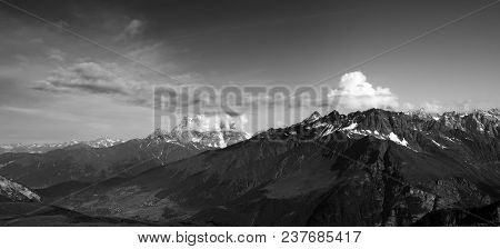 Black And White Panorama Of Summer Mountain With Snow. Caucasus Mountains. Georgia, Region Svaneti