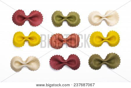 Handmade Multi-colored Paste In The Shape Of A Bow On A White Background Close-up