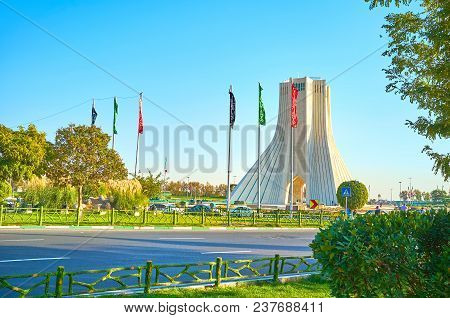 Azadi Tower Is Surrounded By Festival Flags Containing The Names Of Imams And Muslim Prays Due To Th