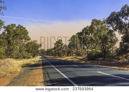 Approaching A Dust Storm While Driving Along The Goldfields Way Between Wagga Wagga And Temora, New 