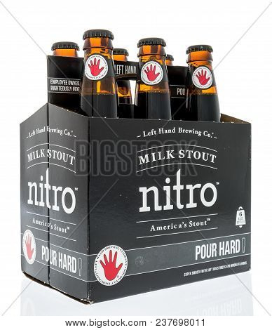 Winneconne, Wi -  20 April 2018: A Six Pack Of Left Hand Milk Stout Nitro Beer On An Isolated Backgr