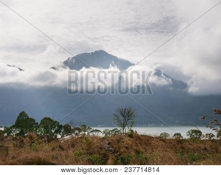Lake Batur In The Crater Of A Volcano. Volcano Mount And Lake Batur Located In Kintamani Area In Bal