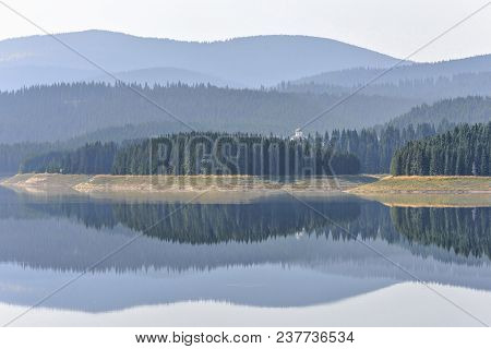 Daylight Misty View To Oasa Dam Lake With Mountains