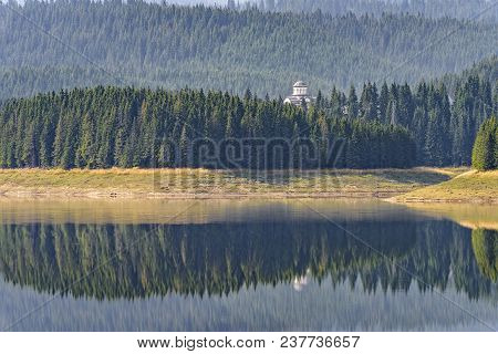 Daylight Misty View To Oasa Dam Lake With Mountains