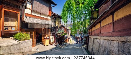 View To Small Street With Sakura Tree In Higashiyama District, Kyoto, Japan. Traditional Japanese Ho