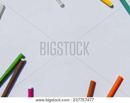 White Sheet Of Paper With Markers. View From Above