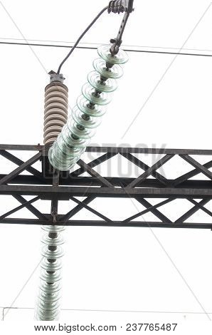 High-voltage Electrical Insulator Electric Line. Glass Insulators On Wires