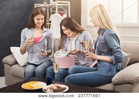 Excited Woman Getting Present From Her Friends. Celebration, Henparty Before Wedding And Female Frie