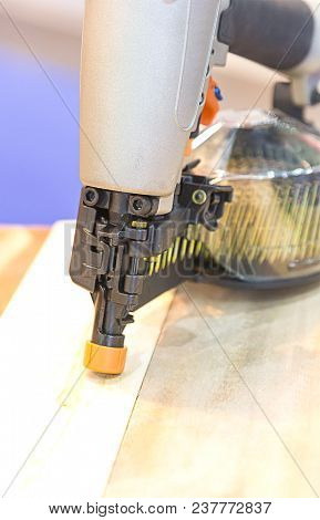 Nail Gun On Table In The Industrial Factory