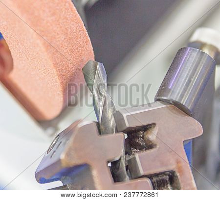 Drill Sharpening Machine By Grindstone In The Industrial Factory