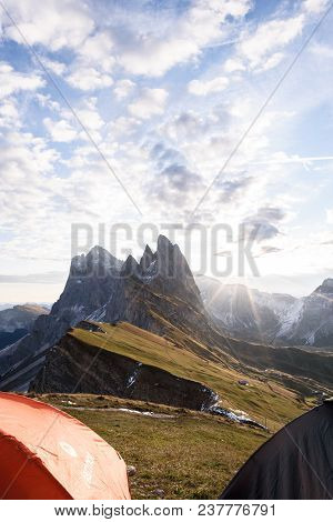 View From Tent To Mountains At Sunset In Summer, Dolomites Alps