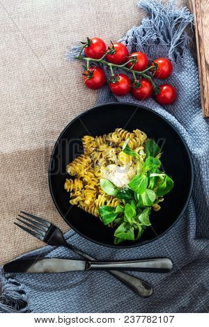 Radiatori pasta in a creamy tomato parmesan cheese sauce