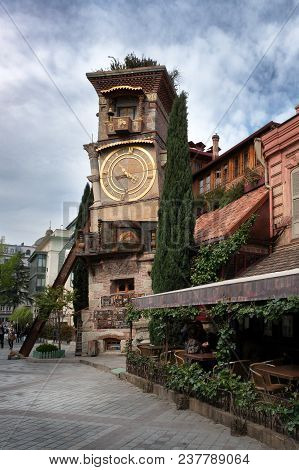 2018 04.23 Georgiy, Tbilisi, Tbilisi Clock Tower In The Old Town, Near The Puppet Theater. The Pictu