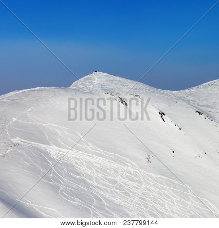 Off-piste Snowy Slope With Trace From Skis And Snowboards. Caucasus Mountains, Georgia, Region Gudau