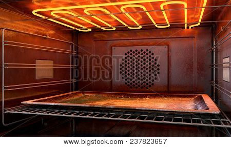 A Close View Inside A  Hot Operational Household Oven With An Empty Tanished Baking Tray - 3d Render