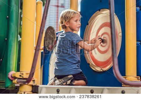 Funny Cute Happy Baby Playing On The Playground. The Emotion Of Happiness, Fun, Joy.