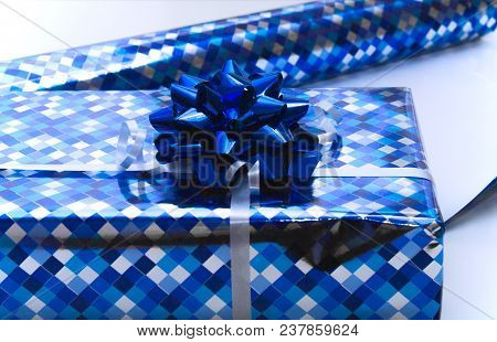 Bright Blue Gift Box With Silber Ribbon Bow