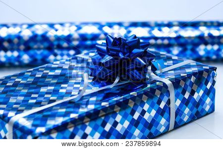 Bright Blue Gift Box With Silber Ribbon Bow