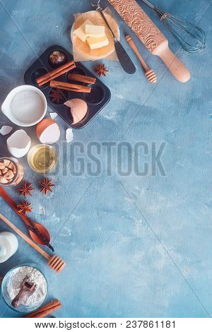 Cooking Concept With Baking Tools And Ingredients. Muffin Tin, Rolling Pin, Whisk, Honey Spoon, Milk