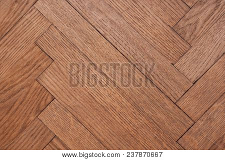 Part Of The Parquet In A Natural Wood Texture Laid Out On The Floor Like A Herringbone