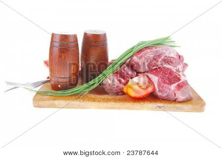 savory : bloody beef raw steak on wood cut board ready to cooking