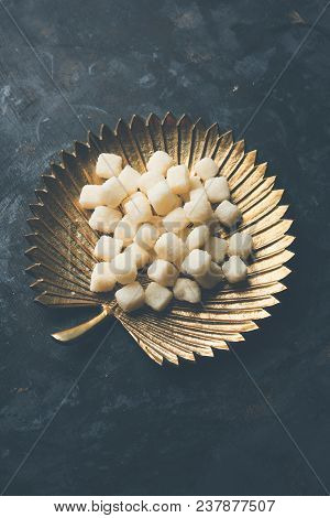 Bengali Sweet Chena Murki Served In A Golden Plate, Selective Focus