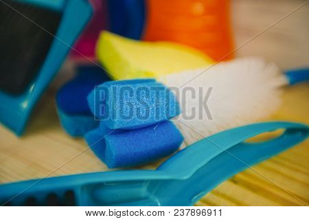 Cleaning House Or Office Concept. Aset Of Cleaning Supplies With A Bottle Brush On Natural Wooden Ba