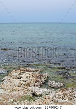 Old Stone Pier In The Green Water In Mallorca, Spain