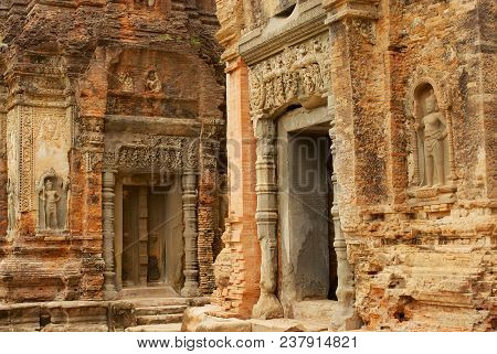 Siem Reap, Cambodia - August 10, 2008: View To The Wall Carving At The Ruins Of The Preah Ko Temple 