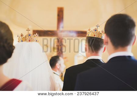 Wedding Couple Bide And Groom Get Married In A Church.