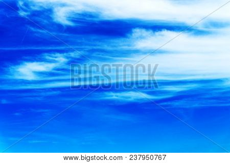 Blue Sky With Clouds Background Or Texture