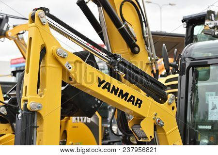Vilnius, Lithuania - April 25: Yanmar Excavator And Logo On April 25, 2018 In Vilnius Lithuania. Yan